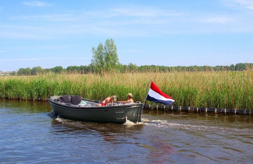 Opperdoes House | Holiday Home in Medemblik with Private Jetty
