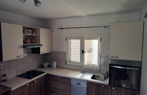 Maslinica House | Holiday Home Maja - Four Bedroom Holiday Home with Terrace and Sea View
