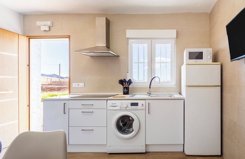 Pujaire House | Holiday Home 'Nido' with Private Terrace and Air Conditioning