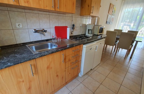 Szantod House | Holiday home only 80 m from private beach, with a small boat and air conditioning
