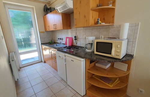 Szantod House | Holiday home only 80 m from private beach, with a small boat and air conditioning