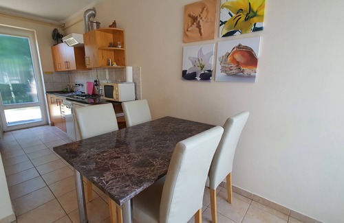 Szantod House | Holiday home only 80 m from private beach, with a small boat and air conditioning