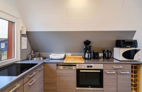 Sudbrookmerland House | Holiday Home 'Schmidt' with Private Terrace, Private Garden and Wi-Fi