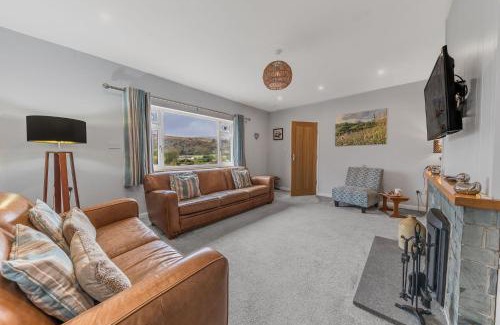 Torver House | Hollace, Lake District bungalow with hot tub and stunning views