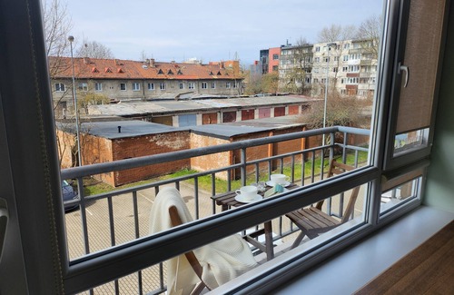 Klaipeda Apartment | Home-spirit apartment with a panoramic window in the heart of Klaipėda!