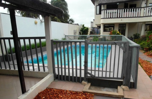 Grand Popo Apartment | Homerez - 10 m away from the beach! Nice studio for 2 ppl. with shared pool