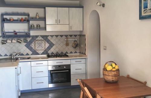 Santa Marina Salina House | Homerez - Romantic House with View in Santa Marina