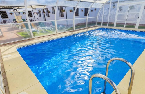 Rivero de Posadas Villa | Homerez - Villa for 20 ppl. with swimming-pool and terrace at Rivero de Posadas