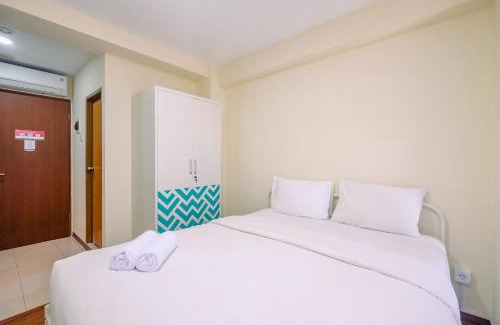 Kayu Putih Apartment | Homey and Cozy Living Studio Room at Tifolia Apartment By Travelio