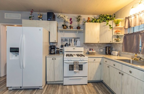 Tucson House | Homey midtown house sleeps 5. 30 days or longer only. Kids/pets, private hot tub