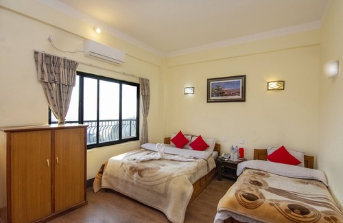 Nagarkot Hotel | Hotel Marigold with panoramic view of mountain range and temperate forest