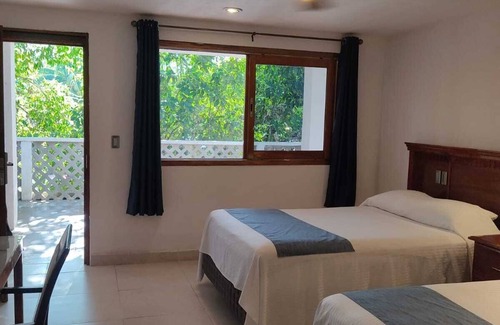 Piste Hotel | HOTEL PUERTA CHICHEN