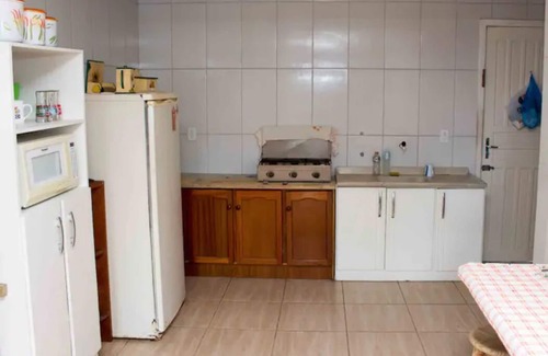Balneario Arroio do Silva House | House overlooking the sea a few steps from the beach, with kiosk for events