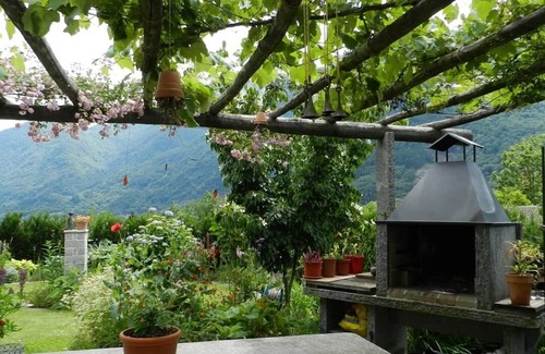 Aurigeno House | House by the waterfall with stunning view, surrounded by vineyards: A hidden gem