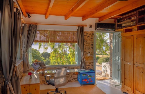 Gourna Cottage | House facing the sea with 5,000 m² garden, swimming pool and unforgettable sunsets.