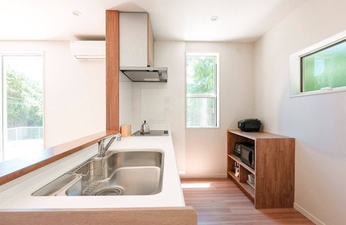 Kawazu House | House surrounded by trees with a dog run/Kamogun Shizuoka