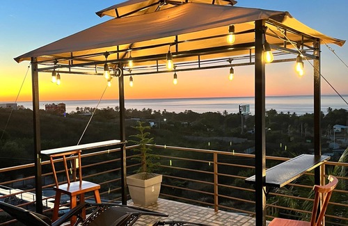 Santa Tecla House | house with a beautiful sea view in enchanting SurfCity with WiFi, AC and Pool.