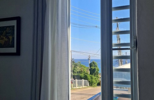 Isabela House | House with ocean view. Walking distance to the beaches and town.