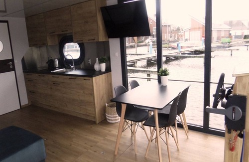 Municipality of Uitgeest Boat Rental | Houseboat at Marina with Lake Views