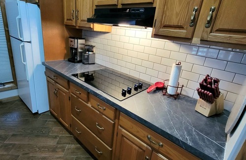 Mancelona Condo | Huge! 2brm KING bed, 2bath sleeps 4 adults only WIFi,Close to Torch Lake, pool