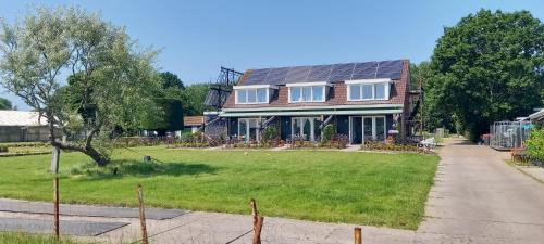 Municipality of Uithoorn Apartment | Huis over de dijk