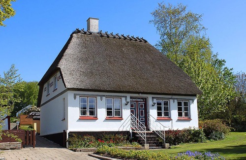Nordborg House | Hus Gammeldags in a charming village location on Als, with four bedrooms and fireplace