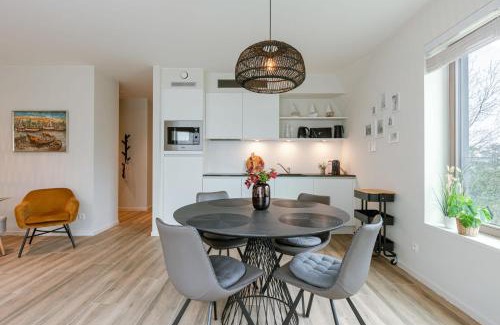 Westende Apartment | Huswell - Spacious top-floor apartment with private parking