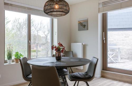 Westende Apartment | Huswell - Spacious top-floor apartment with private parking
