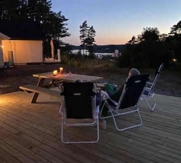 Grimstad House | Hytte med sjøutsikt og 20 min fra dyreparken
