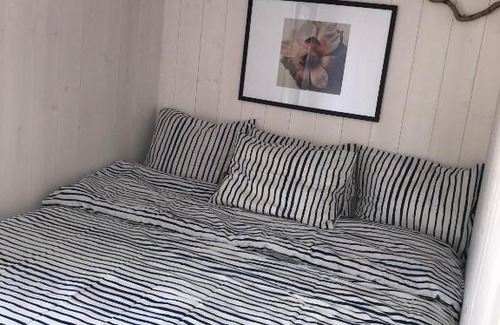 Grimstad House | Hytte med sjøutsikt og 20 min fra dyreparken
