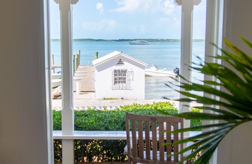 Dunmore Town House | Iconic Waterfront Cottage with Sunset Porch