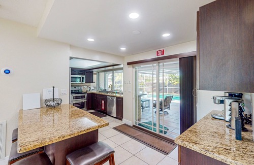 Hollywood Hills House | Ideally located home with enclosed pool, grill, W/D, & AC - snowbird-friendly