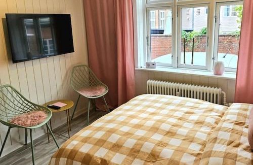 Viborg Apartment | Idyllisk Mini-Hus i det charmerende Latinerkvarter