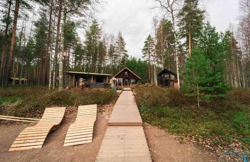 Loppi Ski Chalet | Ihana paikka jossa ulkoporeallas sekä pihasauna