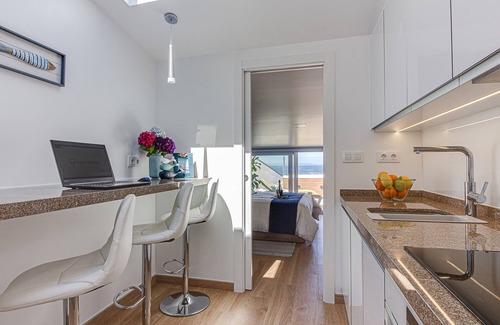 Laracha Apartment | In Caión: Attic-Suite with 2 terraces and Jacuzzi on the seafront