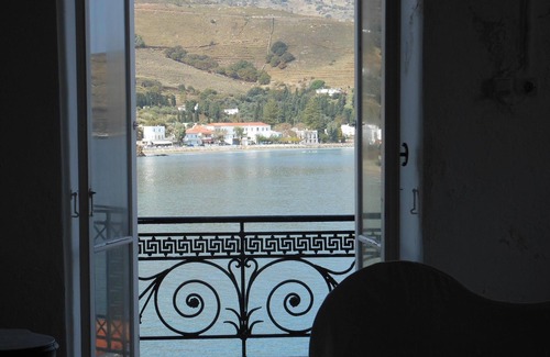 Paleopolis House | In Chora top floor of 1871 built stone wall Mansion, amazing view