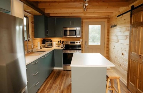 Malagash Mine House | Indulge in Serenity at The Golden Pearl: A Beautiful Log Cottage Escape