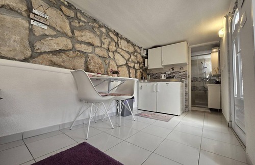 Lozica Apartment | Indy's Beach Apartments- Studio Apartment with Patio and Sea View