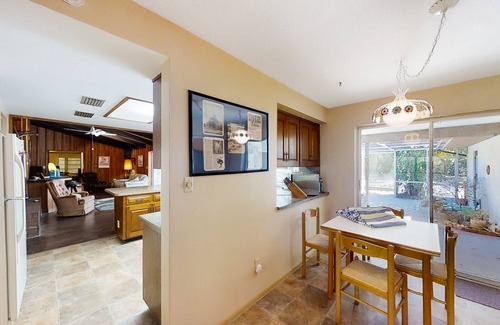 East Lake House | Inviting home with pool, patio, grill, full kitchen, central AC, & W/D