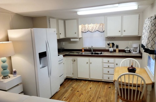 Key Largo Village House | Island Paradise with private beach & private bay sunset views.