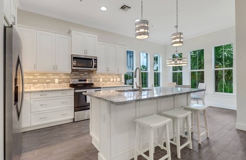 Isles of Collier Preserve Apartment | Isles of Collier | 3 bedrooms | 3 bathrooms | a den/office | sunroom | 2-car garage.