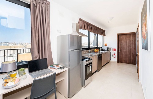 Qawra Apartment | Islet Promenade Seafront Penthouse with Hot Tub