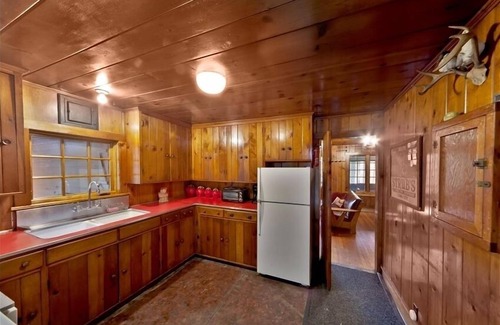 Milford Cabin | Isolated Creekside Knotty Pine 1930s Lodge on 575 Acre Forest Preserve
