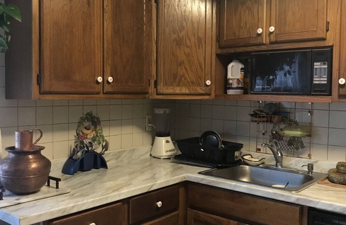Montclair House | It’s 2 level and 3 bedroom townhome with kitchen and living room.