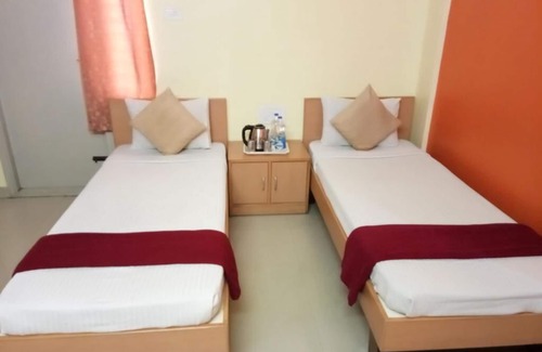 Vijayanagar 1st Stage Hotel | Jasmine Apartment Suites