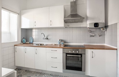 Sao Domingos de Benfica Apartment | JOIVY Striking flat in Benfica