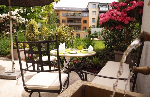 Sudstadt Apartment | Juniorsuite mit kombiniertem Wohn-/Schlafbereich, Dusche und WC