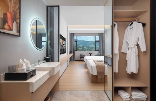 Xiangxi Hotel | JunYa Hotel of Hibiscus town