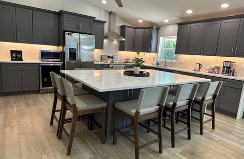 Eastview Manor House | Jupiter Heated Pool/Spa Luxury Home with Private Oasis
