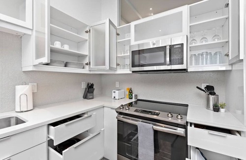 Financial District Apartment | ! King Bed ! Downtown Highrise!